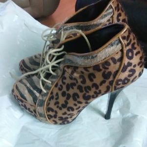 Leopard print ankle heels.